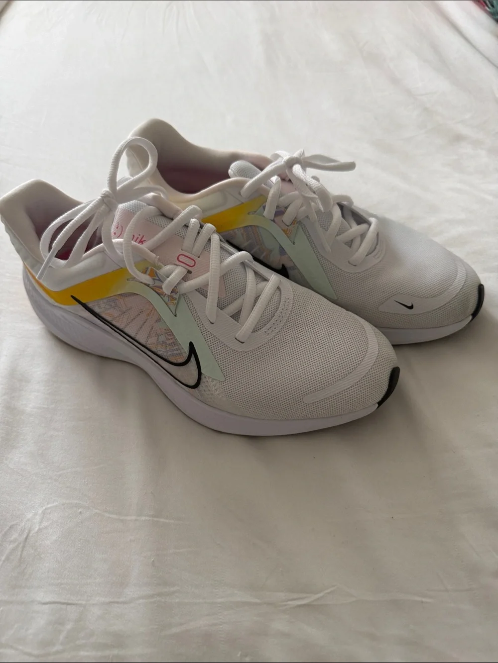Nike Women's White Running Shoes with Yellow Accent and Black Swoosh